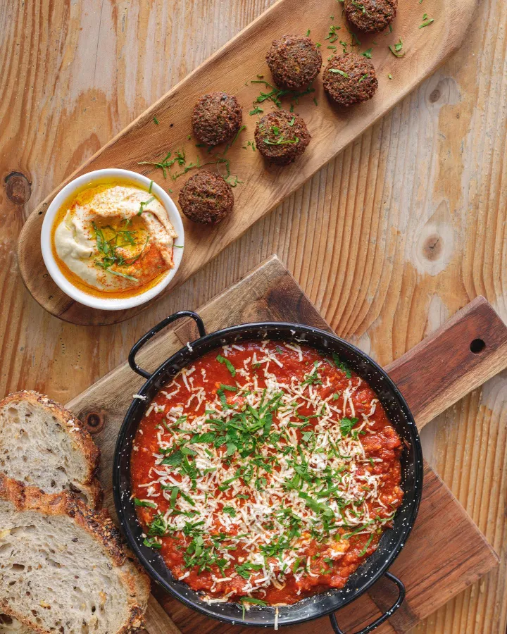 shakshuka with falafel on the table